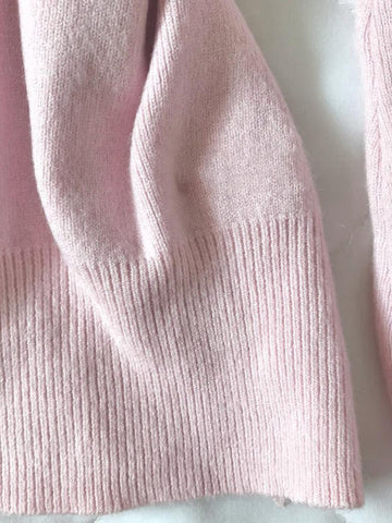 Original pink one-shoulder sweater