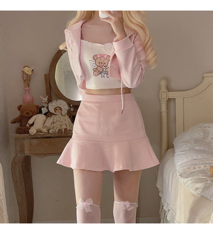 Pink sweatshirt suit and fishtail hip skirt show off your figure
