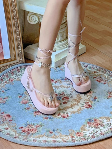 Pink strappy slippers